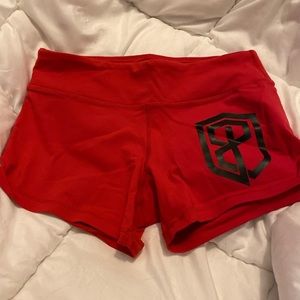 Born primitive red booty shorts